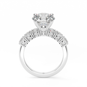 White Gold Round Shape Diamond Side Stone Engagement Ring With Prong Setting